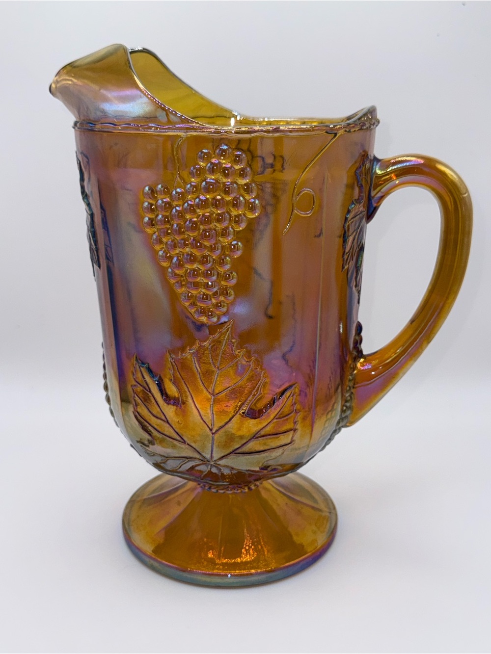 1970s Indiana Glass Iridescent Amber Carnival Pitcher with Grape & Leaf Pattern